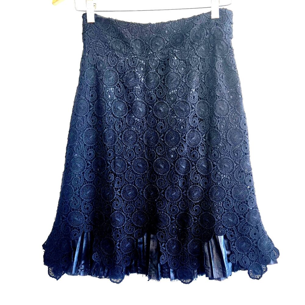 Size 2 – Anthropologie black crochet overlay skirt with pleated satin hem